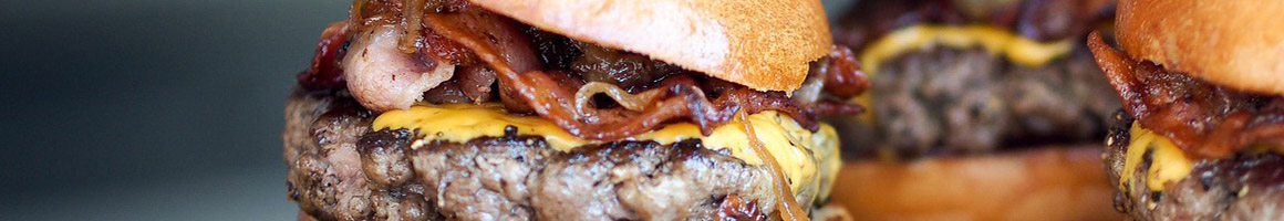 Eating Burger Pub Food at Hooligans Pub restaurant in Arlington, TX.